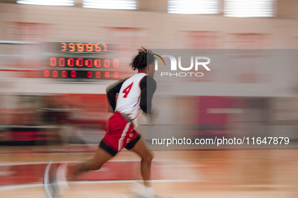 Wisconsin Badgers guard Kamari McGee #4 runs a drill during local media day at the Nicholas Johnson Pavilion in Madison, WI, on October 7, 2...