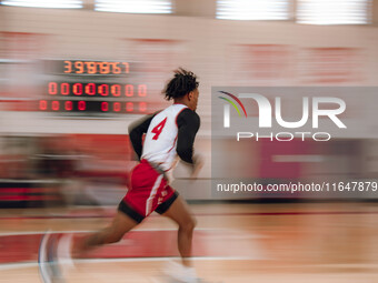 Wisconsin Badgers guard Kamari McGee #4 runs a drill during local media day at the Nicholas Johnson Pavilion in Madison, WI, on October 7, 2...