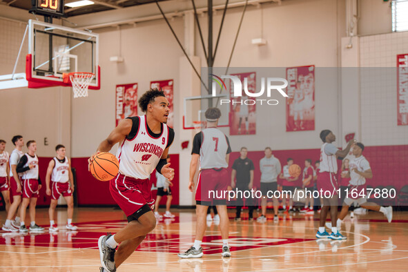 Wisconsin Badgers guard John Tonje #9 runs a drill during practice at the Nicholas Johnson Pavilion in Madison, WI, on October 7, 2024. 