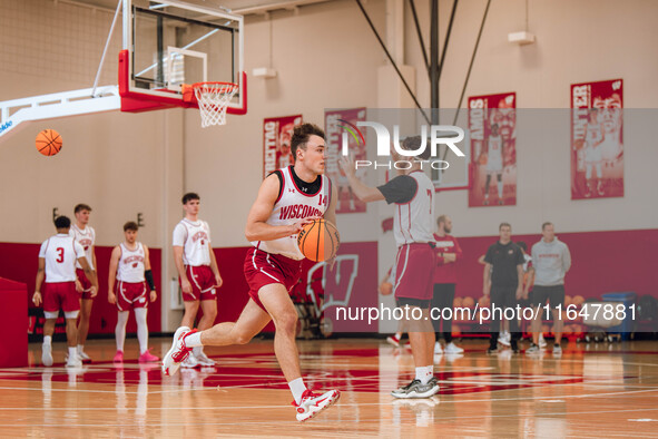 Wisconsin Badgers guard Aidan Konop #14 runs a drill during practice at the Nicholas Johnson Pavilion in Madison, WI, on October 7, 2024. 