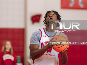 Wisconsin Badgers forward Xavier Amos #13 eyes a layup during practice at the Nicholas Johnson Pavilion in Madison, WI, on October 7, 2024....