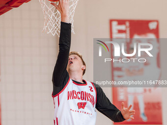 Wisconsin Badgers forward Jack Robison #2 performs a layup during a practice at the Nicholas Johnson Pavilion in Madison, WI, on October 7,...