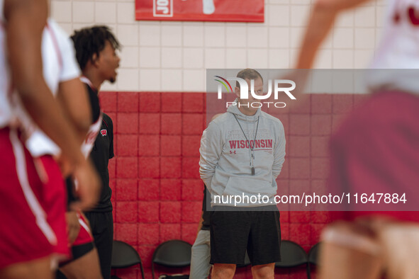 Wisconsin Badgers Associate Head Coach Joe Krabbenhoft looks on during practice at the Nicholas Johnson Pavilion in Madison, WI, on October...