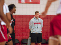 Wisconsin Badgers Associate Head Coach Joe Krabbenhoft looks on during practice at the Nicholas Johnson Pavilion in Madison, WI, on October...