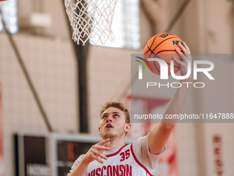 Wisconsin Badgers forward Markus Ilver #35 eyes the hoop during practice at the Nicholas Johnson Pavilion in Madison, WI, on October 7, 2024...