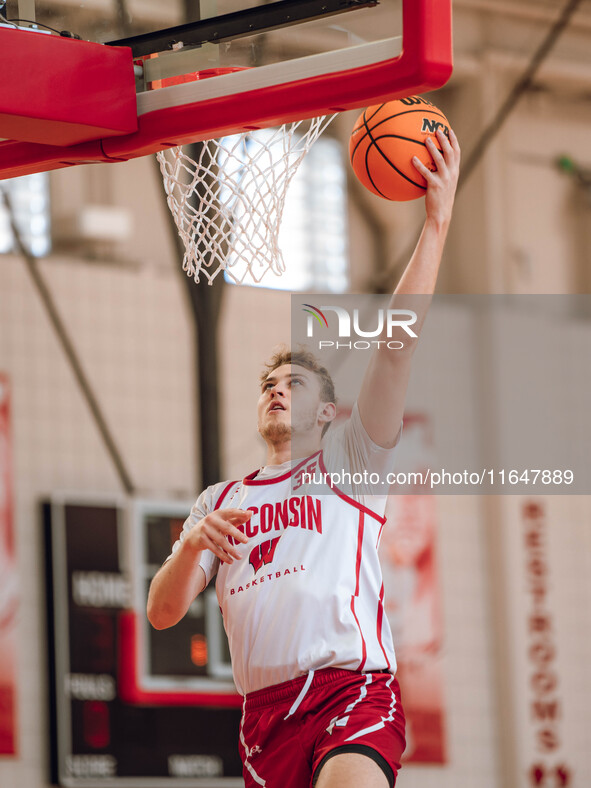 Wisconsin Badgers forward Markus Ilver #35 eyes the hoop during practice at the Nicholas Johnson Pavilion in Madison, WI, on October 7, 2024...