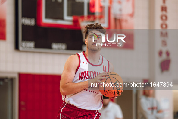 Wisconsin Badgers guard Max Klesmit #11 eyes the rim during practice at the Nicholas Johnson Pavilion in Madison, WI, on October 7, 2024. 