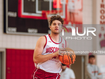 Wisconsin Badgers guard Max Klesmit #11 eyes the rim during practice at the Nicholas Johnson Pavilion in Madison, WI, on October 7, 2024. (