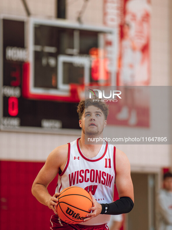 Wisconsin Badgers guard Max Klesmit #11 eyes the rim during practice at the Nicholas Johnson Pavilion in Madison, WI, on October 7, 2024. 