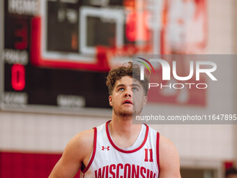 Wisconsin Badgers guard Max Klesmit #11 eyes the rim during practice at the Nicholas Johnson Pavilion in Madison, WI, on October 7, 2024. (