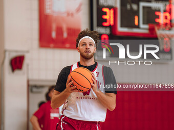 Wisconsin Badgers forward Carter Gilmore #7 goes in for a layup during practice at the Nicholas Johnson Pavilion in Madison, WI, on October...