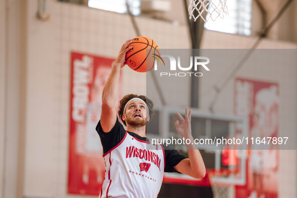 Wisconsin Badgers forward Carter Gilmore #7 goes in for a layup during practice at the Nicholas Johnson Pavilion in Madison, WI, on October...