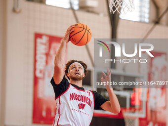 Wisconsin Badgers forward Carter Gilmore #7 goes in for a layup during practice at the Nicholas Johnson Pavilion in Madison, WI, on October...