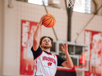 Wisconsin Badgers forward Carter Gilmore #7 goes in for a layup during practice at the Nicholas Johnson Pavilion in Madison, WI, on October...