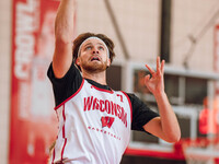 Wisconsin Badgers forward Carter Gilmore #7 goes in for a layup during practice at the Nicholas Johnson Pavilion in Madison, WI, on October...