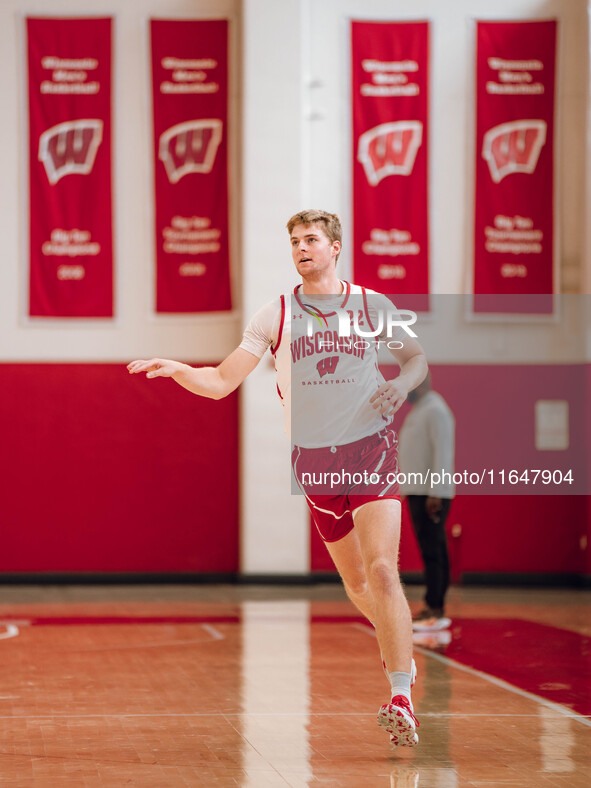 Wisconsin Badgers forward Steven Crowl #22 runs a drill during practice at the Nicholas Johnson Pavilion in Madison, WI, on October 7, 2024....