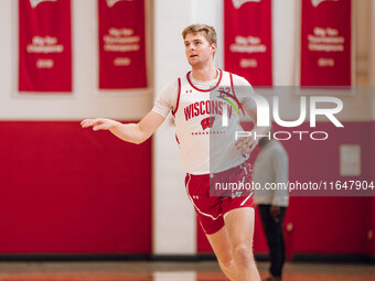 Wisconsin Badgers forward Steven Crowl #22 runs a drill during practice at the Nicholas Johnson Pavilion in Madison, WI, on October 7, 2024....