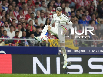 Federico Valverde central midfield of Real Madrid and Uruguay controls the ball during the LaLiga match between Atletico de Madrid and Real...