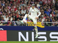 Federico Valverde central midfield of Real Madrid and Uruguay controls the ball during the LaLiga match between Atletico de Madrid and Real...