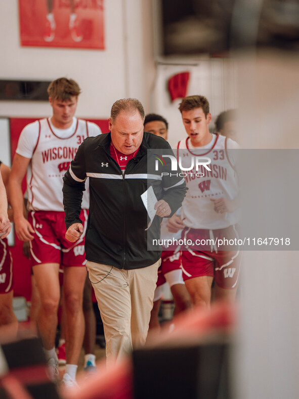 Wisconsin Badgers Head Coach Greg Gard leads the team onto the court during practice at the Nicholas Johnson Pavilion in Madison, WI, on Oct...