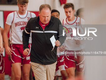 Wisconsin Badgers Head Coach Greg Gard leads the team onto the court during practice at the Nicholas Johnson Pavilion in Madison, WI, on Oct...