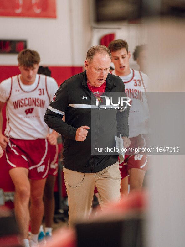 Wisconsin Badgers Head Coach Greg Gard leads the team onto the court during practice at the Nicholas Johnson Pavilion in Madison, WI, on Oct...