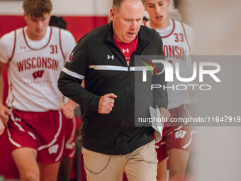 Wisconsin Badgers Head Coach Greg Gard leads the team onto the court during practice at the Nicholas Johnson Pavilion in Madison, WI, on Oct...