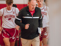 Wisconsin Badgers Head Coach Greg Gard leads the team onto the court during practice at the Nicholas Johnson Pavilion in Madison, WI, on Oct...