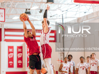 Wisconsin Badgers guard Max Klesmit #11 runs a drill during practice at the Nicholas Johnson Pavilion in Madison, WI, on October 7, 2024. (