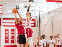 Wisconsin Badgers guard Max Klesmit #11 runs a drill during practice at the Nicholas Johnson Pavilion in Madison, WI, on October 7, 2024. (