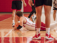 Wisconsin Badgers guard Max Klesmit #11 dives for a loose ball during practice at the Nicholas Johnson Pavilion in Madison, WI, on October 7...