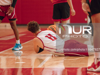 Wisconsin Badgers guard Max Klesmit #11 dives for a loose ball during practice at the Nicholas Johnson Pavilion in Madison, WI, on October 7...