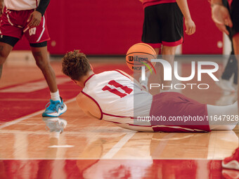 Wisconsin Badgers guard Max Klesmit #11 dives for a loose ball during practice at the Nicholas Johnson Pavilion in Madison, WI, on October 7...