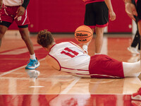 Wisconsin Badgers guard Max Klesmit #11 dives for a loose ball during practice at the Nicholas Johnson Pavilion in Madison, WI, on October 7...