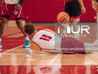 Wisconsin Badgers guard Max Klesmit #11 dives for a loose ball during practice at the Nicholas Johnson Pavilion in Madison, WI, on October 7...