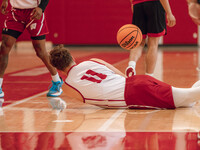 Wisconsin Badgers guard Max Klesmit #11 dives for a loose ball during practice at the Nicholas Johnson Pavilion in Madison, WI, on October 7...