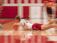 Wisconsin Badgers forward Steven Crowl #22 dives for a loose ball during practice at the Nicholas Johnson Pavilion in Madison, WI, on Octobe...