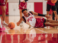 Wisconsin Badgers guard John Tonje #9 dives after a loose ball during practice at the Nicholas Johnson Pavilion in Madison, WI, on October 7...