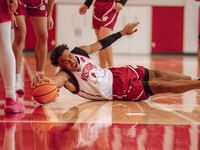 Wisconsin Badgers guard John Tonje #9 dives after a loose ball during practice at the Nicholas Johnson Pavilion in Madison, WI, on October 7...