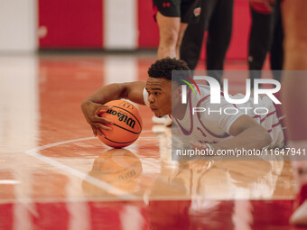 Wisconsin Badgers guard Camren Hunter #3 dives after a loose ball during practice at the Nicholas Johnson Pavilion in Madison, WI, on Octobe...