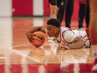 Wisconsin Badgers guard Camren Hunter #3 dives after a loose ball during practice at the Nicholas Johnson Pavilion in Madison, WI, on Octobe...