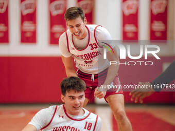 Wisconsin Badgers guard Jack Janicki #33 watches forward Riccardo Greppi #18 during practice at the Nicholas Johnson Pavilion in Madison, WI...