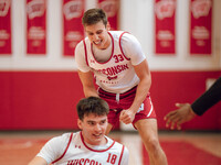 Wisconsin Badgers guard Jack Janicki #33 watches forward Riccardo Greppi #18 during practice at the Nicholas Johnson Pavilion in Madison, WI...