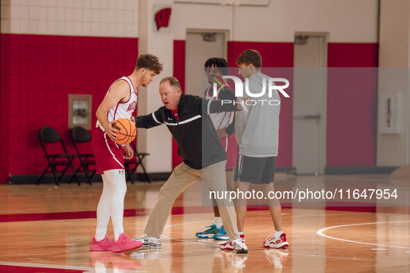 Wisconsin Badgers Head Coach Greg Gard works with guard Max Klesmit #11 during practice at the Nicholas Johnson Pavilion in Madison, WI, on...