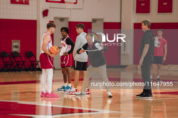 Wisconsin Badgers Head Coach Greg Gard works with guard Max Klesmit #11 during practice at the Nicholas Johnson Pavilion in Madison, WI, on...