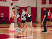 Wisconsin Badgers Head Coach Greg Gard works with guard Max Klesmit #11 during practice at the Nicholas Johnson Pavilion in Madison, WI, on...