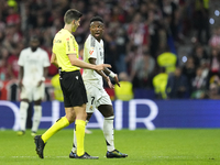 Vinicius Junior left winger of Real Madrid and Brazil talks with the referee during the LaLiga match between Atletico de Madrid and Real Mad...