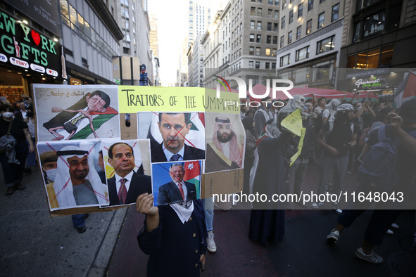 Palestinian supporters march through the streets with flags and signs against the October 2023 Israeli incursion of Gaza, on October 7, 2024...