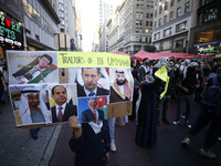 Palestinian supporters march through the streets with flags and signs against the October 2023 Israeli incursion of Gaza, on October 7, 2024...