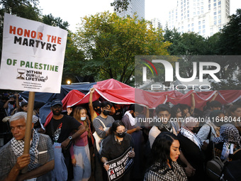 Palestinian supporters gather in Madison Square park with flags and signs against the October 2023 Israeli incursion of Gaza, on October 7,...